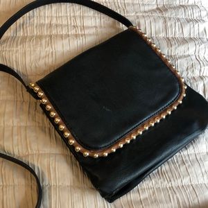 Black purse with brown/gold accent